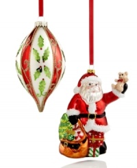 All in the name of cheer. A timeless drop ornament adorned with festive holly and a traditional Santa Claus distributing gifts transform any tree into something truly special. All in the name of cheer. A timeless drop ornament adorned with festive holly and a traditional Santa Claus distributing gifts transform any tree into something truly special.
