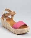 These Eileen Fisher wedges lend just a hint of color--a matte leather band in saturated ultra pink or ocean breathes life into a summery espadrille.