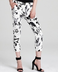 A natural choice for this fresh season, these cropped Tibi pants flaunt a bird and floral print on a easy silhouette for a whimsical look inspired by the runway. A natural choice for this fresh season, these cropped Tibi pants flaunt a bird and floral print on a easy silhouette for a whimsical look inspired by the runway.