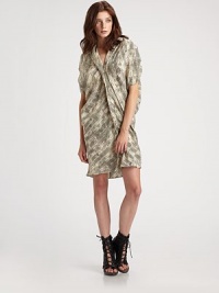 A slouchy shift of printed silk with soft ruching at the neck and shoulders for a modern shape.V necklineDropped shouldersShort sleevesFoldover placketTapered backAbout 19½ from natural waistSilkDry cleanImported A slouchy shift of printed silk with soft ruching at the neck and shoulders for a modern shape.V necklineDropped shouldersShort sleevesFoldover placketTapered backAbout 19½ from natural waistSilkDry cleanImported