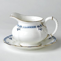 Though Grenville's geometric shapes and studs, set in a narrow border, lend the pattern a modern feel, the stylish leaf and flower elements closely follow classic Derby tradition. Though Grenville's geometric shapes and studs, set in a narrow border, lend the pattern a modern feel, the stylish leaf and flower elements closely follow classic Derby tradition.
