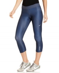 Reach the summit of style in these sleek striped capris from Nike! Its Dri-FIT technology will keep you cool and comfy during long hikes or tough workouts. Reach the summit of style in these sleek striped capris from Nike! Its Dri-FIT technology will keep you cool and comfy during long hikes or tough workouts.