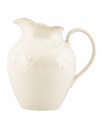 With fanciful beading and a feminine edge, this pitcher from the Lenox French Perle white dinnerware collection has an irresistibly old-fashioned sensibility. Hard-wearing stoneware is dishwasher safe and, in a soft white hue with antiqued trim, a graceful addition to everyday dining.