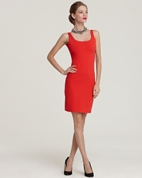 A minimalist silhouette is vibrantly offset by an electric hue on this curve-defining Susan Monaco dress. A minimalist silhouette is vibrantly offset by an electric hue on this curve-defining Susan Monaco dress.