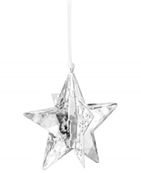 Star bright. The Christmas Moonlight Star ornament brings new brilliance to modern holidays, combining the gleam of Swarovski crystal with goldtone metal and sparkling chatons. Star bright. The Christmas Moonlight Star ornament brings new brilliance to modern holidays, combining the gleam of Swarovski crystal with goldtone metal and sparkling chatons.
