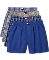 A four-pack wardrobe of cotton boxer shorts, here done in a suitably preppie array of blue-based checks and solids, from Tommy Hilfiger.