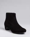 Simply stylish, these Eileen Fisher booties are perfectly streamlined, with elegantly sculpted heels that define the design.