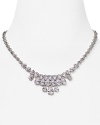 Designed to be flaunted front and center, this Nadri necklace is the most fabulous way to update last year's cocktail dress, plated in rhodium.
