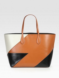 A graphic, colorblock design in luxurious leather.Double top handles, 7 dropOpen topOne removable zip pouch13W X 12H X 5¼DMade in Italy A graphic, colorblock design in luxurious leather.Double top handles, 7 dropOpen topOne removable zip pouch13W X 12H X 5¼DMade in Italy