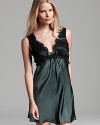 Black lace overlay gives this silky Flora Nikrooz chemise a polished appearance.
