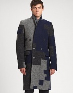 Guaranteed to turn heads, this double-breasted coat made from fine Italian fabric is an undeniable winner.Single-notch lapelButton frontFlap pocketsBack ventAbout 41 from shoulder to hem80% wool/20% polyamideDry cleanImported of Italian fabric