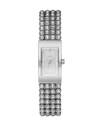 Tell time with rows of shine, thanks to this brilliant DKNY watch. Bracelet crafted from four rows of crystal set in stainless steel and rectangular case. Silvertone dial features silvertone hands, stick indices and logo. Quartz movement. Water resistant to 30 meters. Two-year limited warranty. Tell time with rows of shine, thanks to this brilliant DKNY watch. Bracelet crafted from four rows of crystal set in stainless steel and rectangular case. Silvertone dial features silvertone hands, stick indices and logo. Quartz movement. Water resistant to 30 meters. Two-year limited warranty.