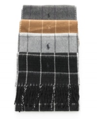 Layer on the sleek lightweight style with the reversible design of this lambswool-blend plaid scarf from Polo Ralph Lauren. Layer on the sleek lightweight style with the reversible design of this lambswool-blend plaid scarf from Polo Ralph Lauren.