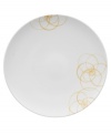 A modern canvas for everyday meals, the Bloom Sun buffet plates have a smooth, flat surface that's artfully scribbled with golden florals for a look that's fresh--and in durable porcelain--not fussy. From Villeroy & Boch.