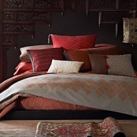 Engineered print on textured cotton fabric inspired by Moroccan embroidery. Coordinates with the Echo Quilt in Sienna and the Split Stitch Sheets. Engineered print on textured cotton fabric inspired by Moroccan embroidery. Coordinates with the Echo Quilt in Sienna and the Split Stitch Sheets.