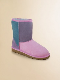 A colorblock, patchwork design that will make any outfit pop with color. Slip-on Sheepskin upper Sheepskin lining Padded insole EVA sole Imported A colorblock, patchwork design that will make any outfit pop with color. Slip-on Sheepskin upper Sheepskin lining Padded insole EVA sole Imported