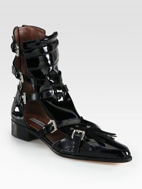 A fringed kilty, daring cutouts and buckled straps add street-style cool to this patent leather design. Stacked heel, 1¼ (30mm)Patent leather upperBuckle straps and back zipLeather lining and solePadded insoleMade in Italy A fringed kilty, daring cutouts and buckled straps add street-style cool to this patent leather design. Stacked heel, 1¼ (30mm)Patent leather upperBuckle straps and back zipLeather lining and solePadded insoleMade in Italy