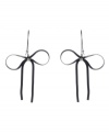 Sleek black bows add an extra touch of edgy style. Betsey Johnson earrings feature a black plated mixed metal setting decorated with sparkling glass stones. Approximate drop: 3 inches.