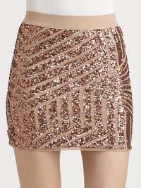 Stripes of sparkling sequins add a touch of graphic glam to this sleek, fitted mini.Elastic waistbandPull-on styleAbout 15 long80% polyester/20% spandexDry cleanImportedModel shown is 5'9½ (176cm) wearing US size Small.This style runs true to size. We recommend ordering your usual size for a standard fit. Stripes of sparkling sequins add a touch of graphic glam to this sleek, fitted mini.Elastic waistbandPull-on styleAbout 15 long80% polyester/20% spandexDry cleanImportedModel shown is 5'9½ (176cm) wearing US size Small.This style runs true to size. We recommend ordering your usual size for a standard fit.