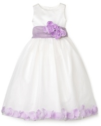 With its flowing skirt, wide ribbon sash and flower detail at waist, the petal dress from US Angels makes every occasion more special. With its flowing skirt, wide ribbon sash and flower detail at waist, the petal dress from US Angels makes every occasion more special.