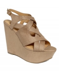 On top of the world. Take your look to new heights with the towering platform wedge of the Nadeen sandals by Kesli Dagger. On top of the world. Take your look to new heights with the towering platform wedge of the Nadeen sandals by Kesli Dagger.