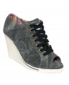 The best of worlds. Nine West's Telsa high wedge sneakers are rugged with a contrasting wedge heel.