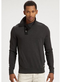 A fashion-forward, funnel neck style constructed in a soft, cotton jersey knit accented by a wide-set button placket in a modern, relaxed fit.Five-button placketFunnel neckSide slash pocketsBanded cuffs and hemCottonMachine washImported