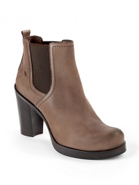 THE LOOKRound toeElastic goring on the sidesPadded insoleStacked heel with notched detail, 3¾ (95mm)Stacked platform, ¾ (20mm)Compares to a 3 heel (75mm)THE MATERIALDistressed leather upperLeather lining and soleORIGINMade in Italy THE LOOKRound toeElastic goring on the sidesPadded insoleStacked heel with notched detail, 3¾ (95mm)Stacked platform, ¾ (20mm)Compares to a 3 heel (75mm)THE MATERIALDistressed leather upperLeather lining and soleORIGINMade in Italy