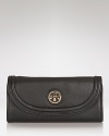 Tory Burch adds some attitude to the every day accessories with this leather wallet. The chic envelope design cleverly disguises multiple pockets which are perfect for keeping the essentials pretty organized.