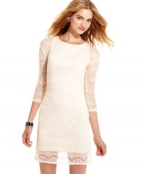 There's something absolutely magnetic about this three-quarter sleeve dress from Planet Gold. Maybe it's the gorgeous lace overlay, or the classic sheath fit that we adore. There's something absolutely magnetic about this three-quarter sleeve dress from Planet Gold. Maybe it's the gorgeous lace overlay, or the classic sheath fit that we adore.