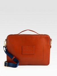 Impeccable craftsmanship and attention to detail defines this streamlined business essential, rendered in a smooth leather finish, with front stitch detail and logo patch detail.Zip closureTop handleAdjustable shoulder strapInterior zip pocketLeather10W x 14H x 2DImported Impeccable craftsmanship and attention to detail defines this streamlined business essential, rendered in a smooth leather finish, with front stitch detail and logo patch detail.Zip closureTop handleAdjustable shoulder strapInterior zip pocketLeather10W x 14H x 2DImported