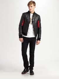 A brilliant combination of the musicians' fashion sensibility and the design team's creative direction, this signature jacket crafted in pebbled leather with contrasting inset lends a sleek, edgy appeal.Zip frontStand collarChest, waist welt pocketsRibbed knit collar, cuffs and hemInset ribbed detailAbout 25 from shoulder to hemLeatherDry cleanImported A brilliant combination of the musicians' fashion sensibility and the design team's creative direction, this signature jacket crafted in pebbled leather with contrasting inset lends a sleek, edgy appeal.Zip frontStand collarChest, waist welt pocketsRibbed knit collar, cuffs and hemInset ribbed detailAbout 25 from shoulder to hemLeatherDry cleanImported