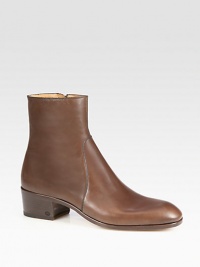 Leather with Cuban heel and embossed interlocking G logo.Side zip closureLeather soleMade in Italy Leather with Cuban heel and embossed interlocking G logo.Side zip closureLeather soleMade in Italy