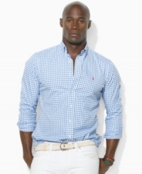 A handsome sport shirt is accented with Ralph Lauren's embroidered pony and tailored for a comfortable, classic fit in checked cotton broadcloth. A handsome sport shirt is accented with Ralph Lauren's embroidered pony and tailored for a comfortable, classic fit in checked cotton broadcloth.