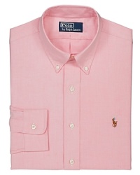 Cut for a trim, modern fit, a long-sleeved sport shirt is rendered in soft oxford-woven cotton for casual comfort. Cut for a trim, modern fit, a long-sleeved sport shirt is rendered in soft oxford-woven cotton for casual comfort.