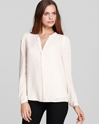 Downtown edge meets effortless bohemia as studded embellishment punctuates a sheer DKNY blouse for an refreshing style mix. Downtown edge meets effortless bohemia as studded embellishment punctuates a sheer DKNY blouse for an refreshing style mix.