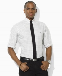 Tailored in a modern trim-fitting silhouette, a windowpane-checked sport shirt is rendered in washed oxford-woven cotton for the look and feel of a well-worn wardrobe favorite. Tailored in a modern trim-fitting silhouette, a windowpane-checked sport shirt is rendered in washed oxford-woven cotton for the look and feel of a well-worn wardrobe favorite.