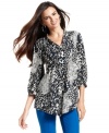 Flecks of cobalt add another element to this black-and-white animal-print petite blouse. Flawless when paired with skinny pants in the same hue! (Clearance)