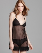 A charming babydoll in mesh with contrasting trim.