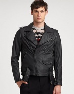 Made from butter-soft Italian leather, this edgy jacket offers style versatility, thanks to its detachable sleeves.Notched collarDetachable sleevesEpaulettesAsymmetrical zipper detailsChest and slash pocketsAbout 25 from shoulder to hemLambskinDry clean by leather specialistImported of Italian fabric