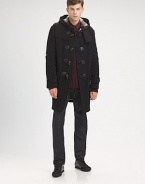 This toggle coat offers Burberry Brit's stylish take on a classic style.Attached hoodToggle closureGunflaps and rainflapPatch pocketsBack yokeAbout 37 from shoulder to hem80% wool/20% polyamideDry cleanImportedThis style runs true to size. We recommend ordering your usual size for a standard fit. 