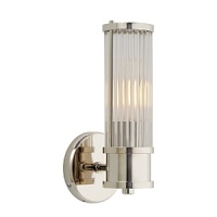 The elongated design and cool polished nickel of this Ralph Lauren sconce lends luxurious light to any space. The elongated design and cool polished nickel of this Ralph Lauren sconce lends luxurious light to any space.