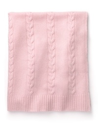 A soft pink cable cashmere blanket by Aqua, wraps baby in sumptuous warmth. A soft pink cable cashmere blanket by Aqua, wraps baby in sumptuous warmth.