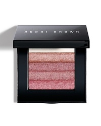 This shimmering, brush-on powder creates a soft, rosy glow. Works well with neutral, pink and rose blush shades. This shimmering, brush-on powder creates a soft, rosy glow. Works well with neutral, pink and rose blush shades.