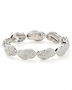 This striking crystal bracelet from Lora Paolo is perfectly ethereal. It boasts one cloud-like station after another for a mesmerizing effect.