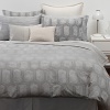A bedskirt in a subdued hue complements the Tortoise collection.