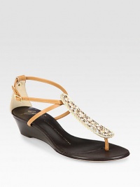 Leather wedge with a glimmering, rhinestone-coated t-strap and an adjustable ankle strap. Self-covered wedge, 1 (25mm)Leather upperLeather liningBuffed leather solePadded insoleMade in ItalyOUR FIT MODEL RECOMMENDS ordering true size. Leather wedge with a glimmering, rhinestone-coated t-strap and an adjustable ankle strap. Self-covered wedge, 1 (25mm)Leather upperLeather liningBuffed leather solePadded insoleMade in ItalyOUR FIT MODEL RECOMMENDS ordering true size.