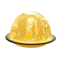 In the world of French art de vivre, Bernardaud is considered the symbol of elite refinement and luxury. A porcelain creation signed by Bernardaud is always appreciated and recognized the world over. Bernardaud artisans use the same technique of hand-sculpting fine, bisque porcelain that was first demonstrated by French artist Paul de Bourgoing in 1828. The glow of a candle shines through the raised and carved surface to contrast light against shadow, revealing a richly detailed design. Bernardaud VotiveLight™ candles add a warm, decorative glow to any room of the home. For a dramatic effect, or to create a festive ambiance, delight your dinner guests by replacing traditional candles with a Bernardaud VotiveLight™. In the world of French art de vivre, Bernardaud is considered the symbol of elite refinement and luxury. A porcelain creation signed by Bernardaud is always appreciated and recognized the world over. Bernardaud artisans use the same technique of hand-sculpting fine, bisque porcelain that was first demonstrated by French artist Paul de Bourgoing in 1828. The glow of a candle shines through the raised and carved surface to contrast light against shadow, revealing a richly detailed design. Bernardaud VotiveLight™ candles add a warm, decorative glow to any room of the home. For a dramatic effect, or to create a festive ambiance, delight your dinner guests by replacing traditional candles with a Bernardaud VotiveLight™.