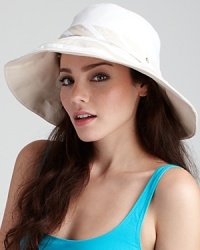 Keep the sun at bay in a glamorous wide brim hat with vine stitched detail. Keep the sun at bay in a glamorous wide brim hat with vine stitched detail.