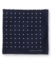 Handcrafted from exceptional silk with a stately polka dot design, this pocket square perfectly accents your distinguished attire. From Turnbull & Asser.